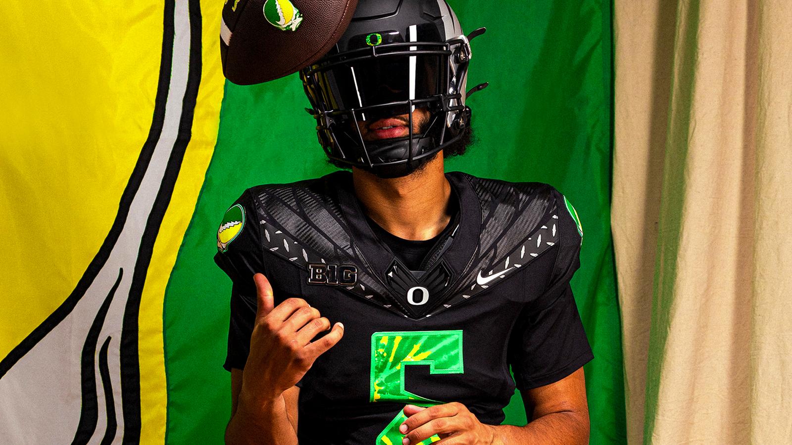 Oregon Ducks all-black uniform with green tie-dye number, worn against Ohio State 2024